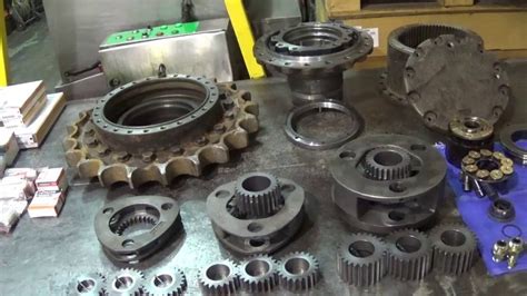 removing final drive gear in a mini excavator|mini excavators final drive removal.